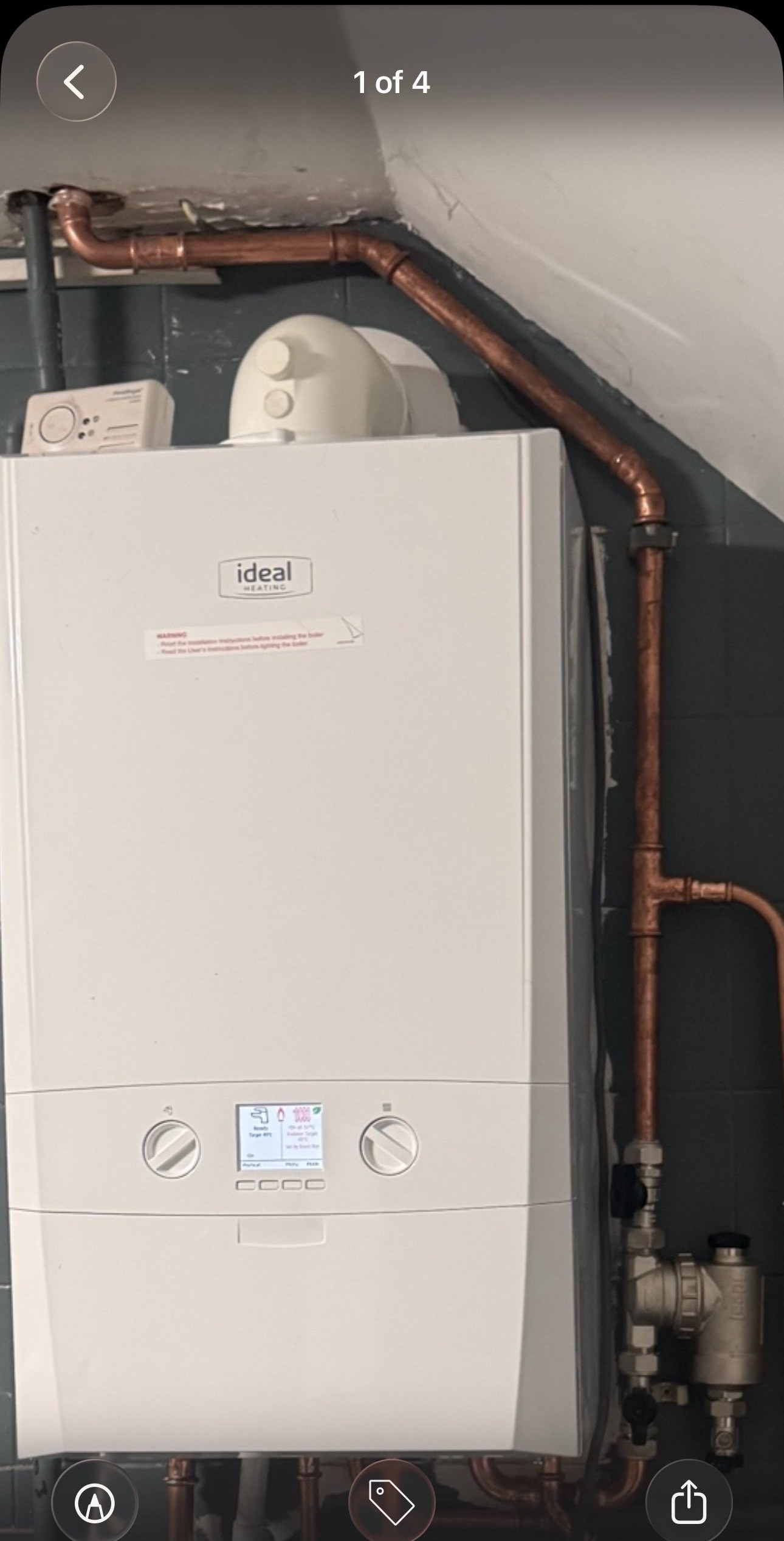 Boiler installation showing new gas valve and controls